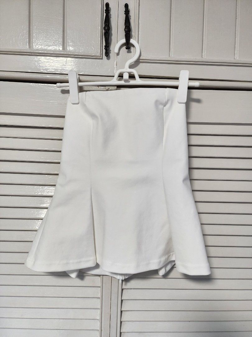 Strapless Peplum Tailored Tube Top Size Small (Category: Blouses) located in Quezon City. Submitted by ShopPDplusK (Listing ID 1360450962, Image 2). Description: Size: Small invisible zip closure, gartered top, thick fabric. Length: 16.5in Condition: Used once, gathered dust in storage. No flaw. RFS: Decluttering. Original Price: 1995 Last price as posted. Payment and pick-up are done on the same day. Delivery Fees and pick up arrangements to be 