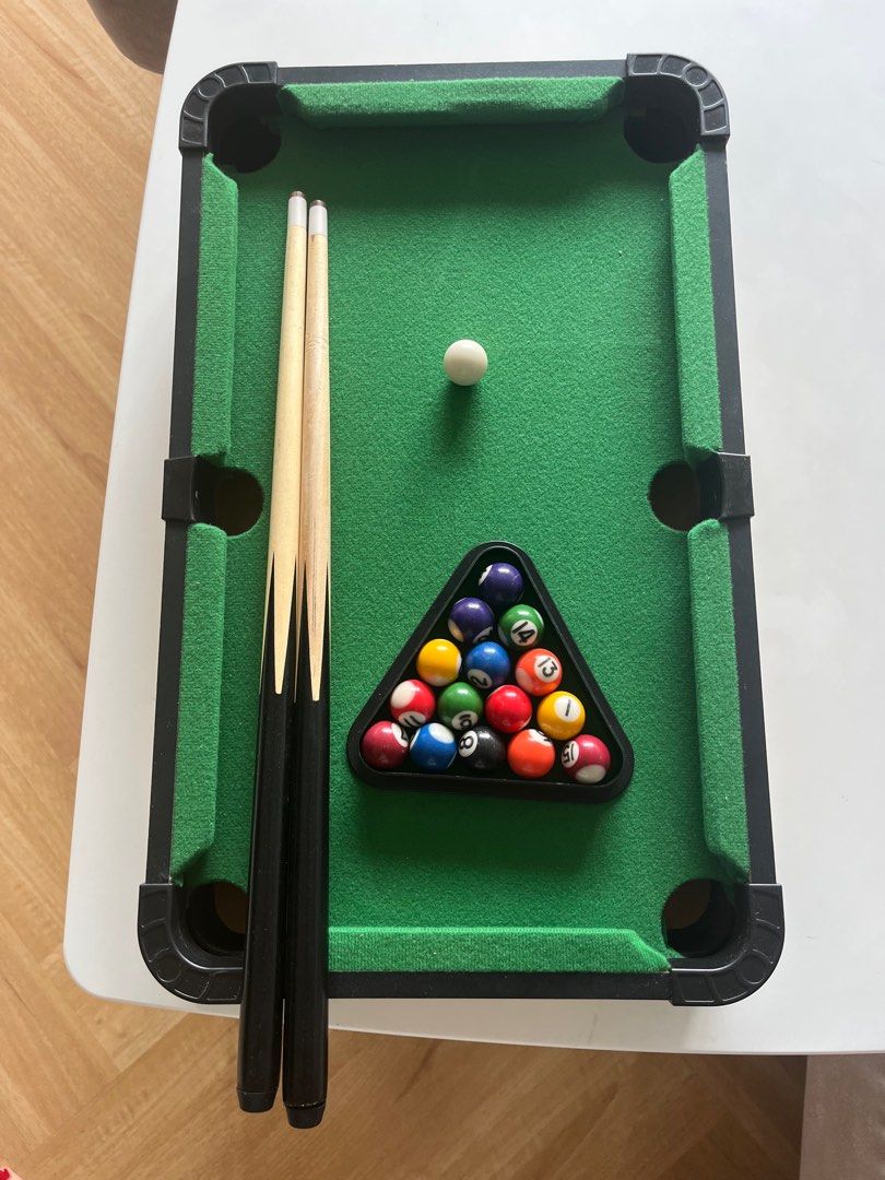 Tabletop Pool Table Set (Category: Board Games & Puzzles) located in Singapore. Submitted by nicoco_ (Listing ID 1360411535, Image 1). Description: Bought from ToysRus. Child only played twice. Selling a tabletop pool table set that is in great condition. It's like new and comes with all the accessories you need to start playing. The table is compact and perfect for small spaces. It's a great way to have fun with friends and family..