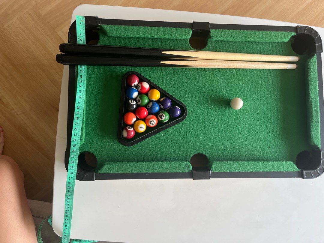 Tabletop Pool Table Set (Category: Board Games & Puzzles) located in Singapore. Submitted by nicoco_ (Listing ID 1360411535, Image 4). Description: Bought from ToysRus. Child only played twice. Selling a tabletop pool table set that is in great condition. It's like new and comes with all the accessories you need to start playing. The table is compact and perfect for small spaces. It's a great way to have fun with friends and family..