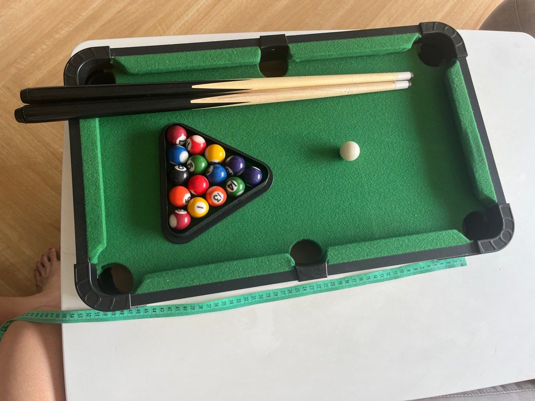 Tabletop Pool Table Set (Category: Board Games & Puzzles) located in Singapore. Submitted by nicoco_ (Listing ID 1360411535, Image 3). Description: Bought from ToysRus. Child only played twice. Selling a tabletop pool table set that is in great condition. It's like new and comes with all the accessories you need to start playing. The table is compact and perfect for small spaces. It's a great way to have fun with friends and family..