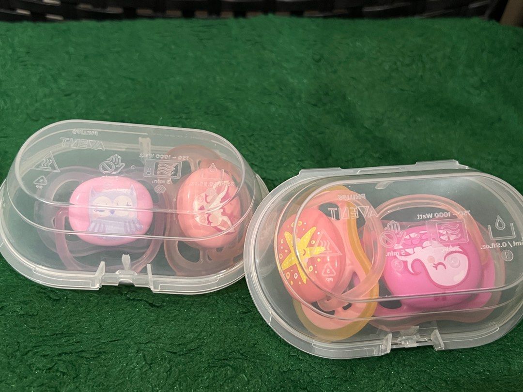 Tommee tippee and avent, buy each (Category: Breastfeeding & Bottle Feeding) located in Mandaluyong City. Submitted by KryzzaM (Listing ID 1360417808, Image 2). Description: All in good condition 🍼Avent pacifier - 300 take all (0-6M : well used, 6-18M : unused natry lang pero ayaw ni baby noon) 🍼Tommee Tippee weaning sippy cup - 200 (hindi nagamit mas gusto ni baby ng straw) Location : Mandaluyong Sf c/o buyer .