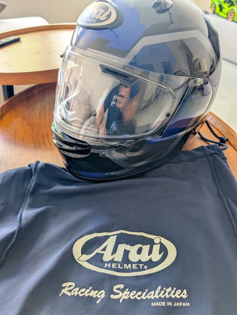 Arai Astro Gx touring helmet (Category: Motorcycle Apparel) located in Singapore. Submitted by ruhshydee (Listing ID 1358446545, Image 3). Description: Selling my beloved Arai astro gx. L size Bought it last year. No receipt cos I didn't think I was going to sell. Bought at $910 Have yet to bring it out for touring but sadly have to sell it. Selling it due to no bike Liao. Used like 3 times to ride around sg. With balaclava everytime. Have applie
