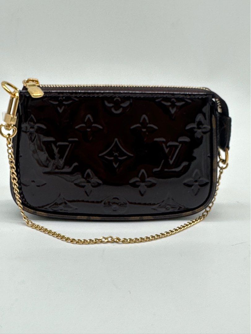 Authentic Louis Vuitton Mini Pochette in Vernis (Category: Luxury Bags & Wallets) located in Manila. Submitted by az.purse (Listing ID 1360630159, Image 1). Description: Unused Comes with box, dustbag .