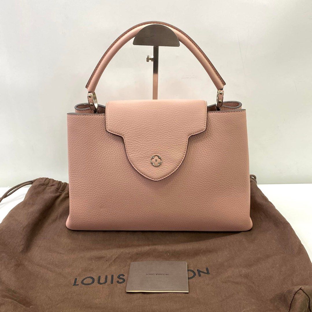 Authentic LV MM size Capucines Top Handle Bag (Category: Luxury Bags & Wallets) located in Quezon City. Submitted by jhaediah (Listing ID 1360571663, Image 1). Description: authentic good condition Preloved Code 28 Location SIngapore.