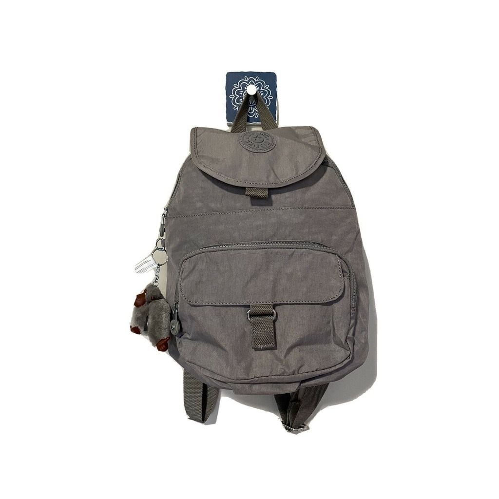 kipling - Queenie Carbon Grey (Category: Backpacks) located in Quezon City. Submitted by nylem (Listing ID 1360609765, Image 1). Description: Bought in Singapore Dimensions: 10"L x 13.25"H x 6.25"D Weight: 0.88 lbs. Features: Nylon Top handle Adjustable shoulder straps Front magnetic pocket Two front zip pockets Magnetic closure Zip around closure Monkey keychain Key clasp Imported.