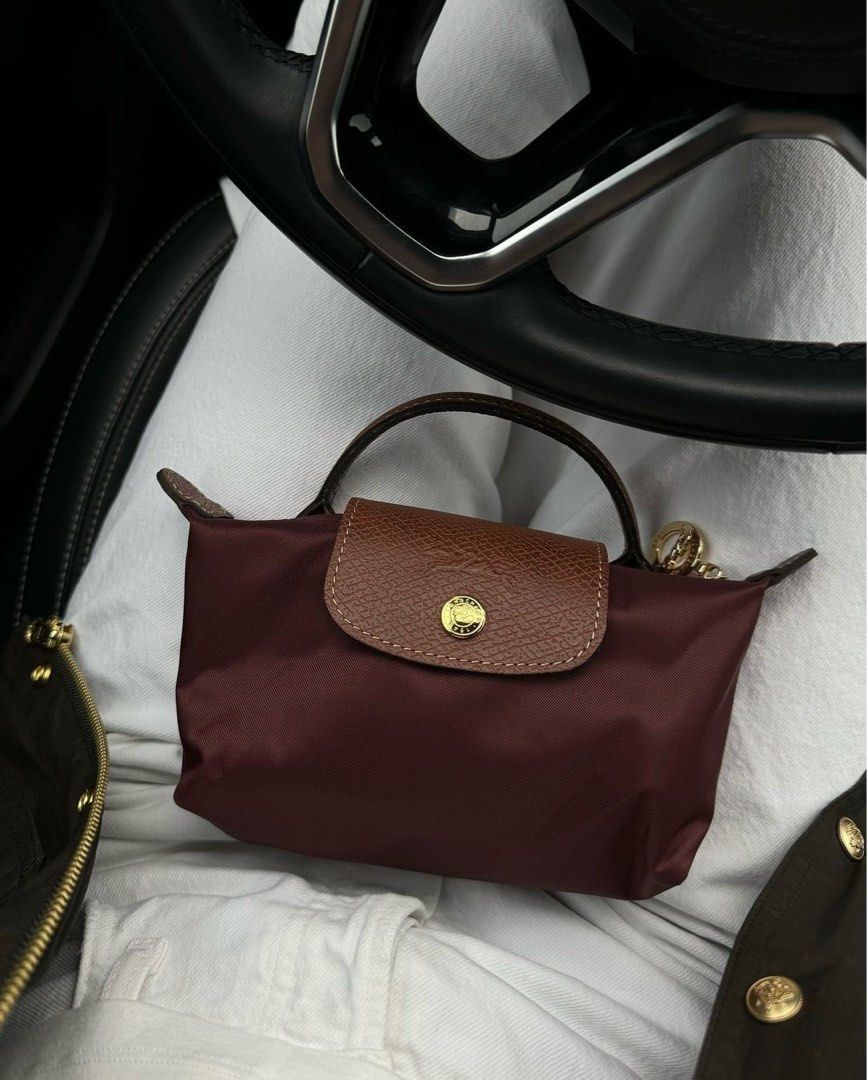 Longchamp Le Pliage XS Mini Pouch (Category: Bags & Wallets) located in Kuala Lumpur. Submitted by qissybag.kl (Listing ID 1360656180, Image 1). Description: open for pre-order🫶🏻. PM for more details! Pre-order from Paris. Retails in Malaysia RM540. Get cheaper price here without tax and duty free! Informative board: The Longchamp Le Pliage Xtra XS Pouch is a small, elegant leather bag designed for carrying essentials. It does not come with a b
