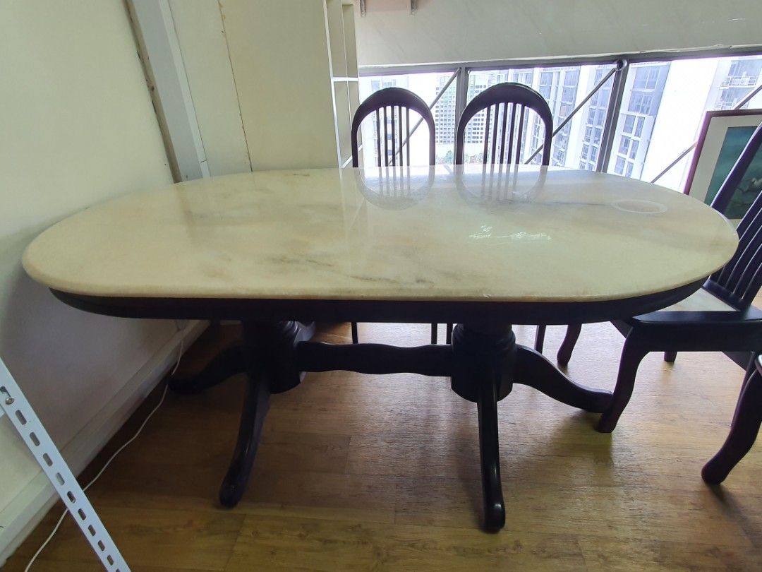 Marble table (Category: Tables & Sets) located in Singapore. Submitted by ahl12 (Listing ID 1360614929, Image 2). Description: Beautiful antique oval marble table with rosewood fitting, including 6 chairs with marble seats. Lots of character. Table: 1.8m length x 1.6m width x 0.7m height. Chair: Seat: 40cm x 40cm x Height 44cm. Self-dismantle, collection and transportation from Yishun North point Bizhub..