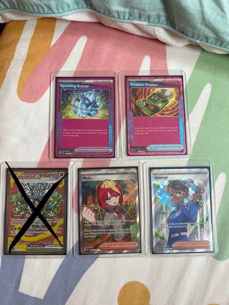 prismatic evolution (Category: Raw Cards) located in Singapore. Submitted by sunsetberri (Listing ID 1360626525, Image 1). Description: •sleeved upon opening •prices: -teal mask ogerpon ex #145/131: (sold) -mela #140/131: $3.50 -amarys #132/131: $3.80 -sparkling crystal #129/131: $2.60 -treasure tracker #131/131: $2.60 •payment: paynow .