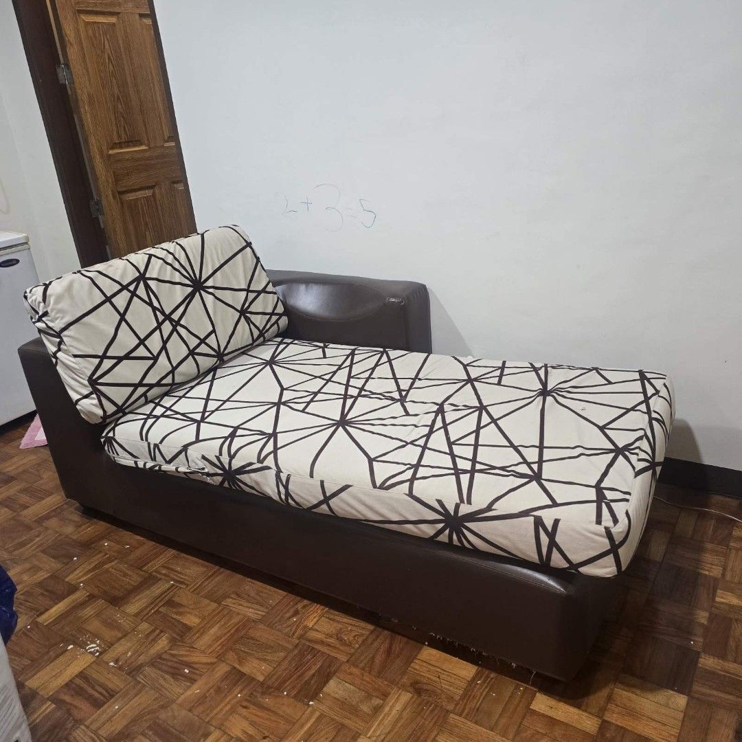 Sofa Lounger Chaise Lounge (Category: Sofas) located in Manila. Submitted by chase168 (Listing ID 1360592746, Image 1). Description: sofa chaise lounge for sale great as a side piece or small apartments very comfortable as is condition cover is washable PU leather on the base.