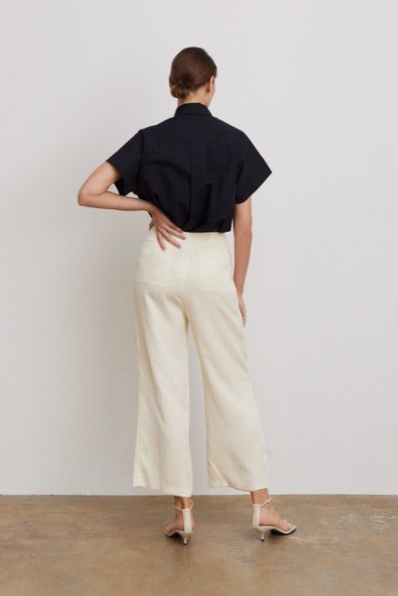 STH Double Pleat Trousers in Ivory Tencel (Category: Other Bottoms) located in Singapore. Submitted by celwears (Listing ID 1360666409, Image 2). Description: worn by previous owner, in great condition with minor piling. selling as its big on me, measurements as shown in last pic size xs S-T-H Double Pleat Trousers in 100% Tencel that is luxuriously soft on the skin for all day comfort. A full-length longline pair of trousers designed for an elon