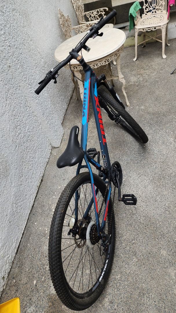 Trinx M100 27.5 Mountain Bike (Category: Bicycles) located in Quezon City. Submitted by kinsenas (Listing ID 1360646733, Image 3). Description: Trinx m100 27.5 4000 bought 8800 all stock Once nagamit noong pandemic tapos tinago na sa bodega May mga kalawang na because of non-use, stuck yung shifter I dont know kung ano ang solution hindi ako maalam masyado sa bike San Bartolome Q.C. area Pwede ipalalamove or pwede din puntahan dito sa amin. .