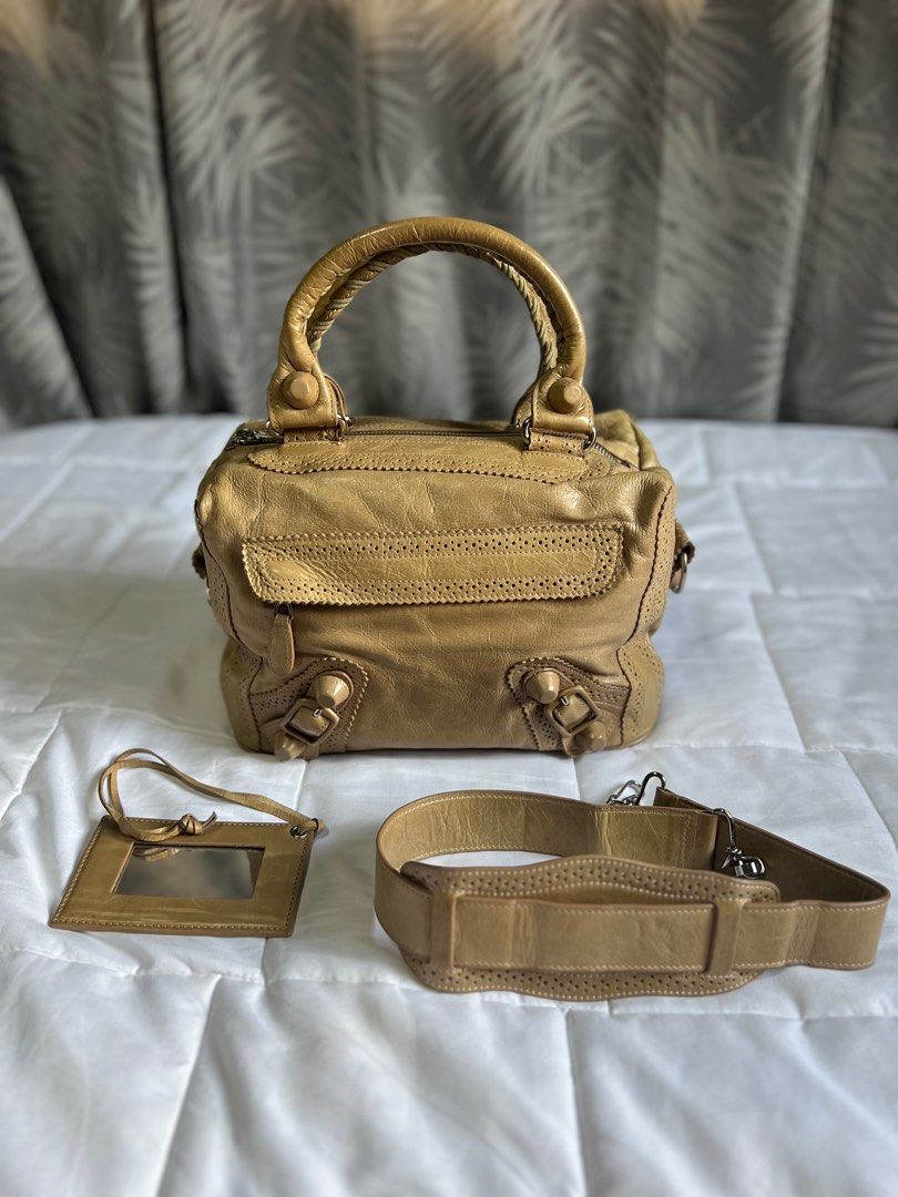 Authentic Balenciaga Beige Bag (Category: Luxury Bags & Wallets) located in Manila. Submitted by urbantrendsetter (Listing ID 1360796935, Image 1). Description: Slightly negotiable 😊 Inclusions: mirror, strap and provided dust bag Please see pictures to appreciate No tarnishing, cracks or tear .