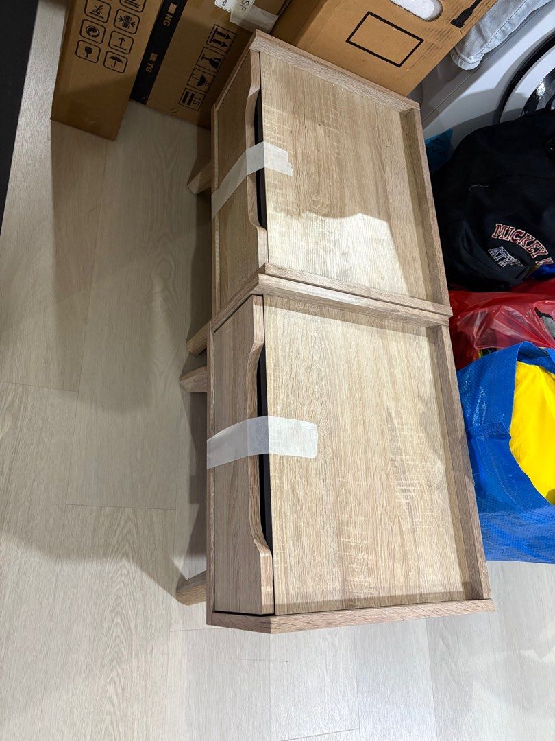 Bedside table (Category: Shelves, Cabinets & Racks) located in Singapore. Submitted by ndrfn (Listing ID 1360849617, Image 1). Description: Bedside table. Still in very good condition. Barely use. Was put in guest room. Its for 2 tables.