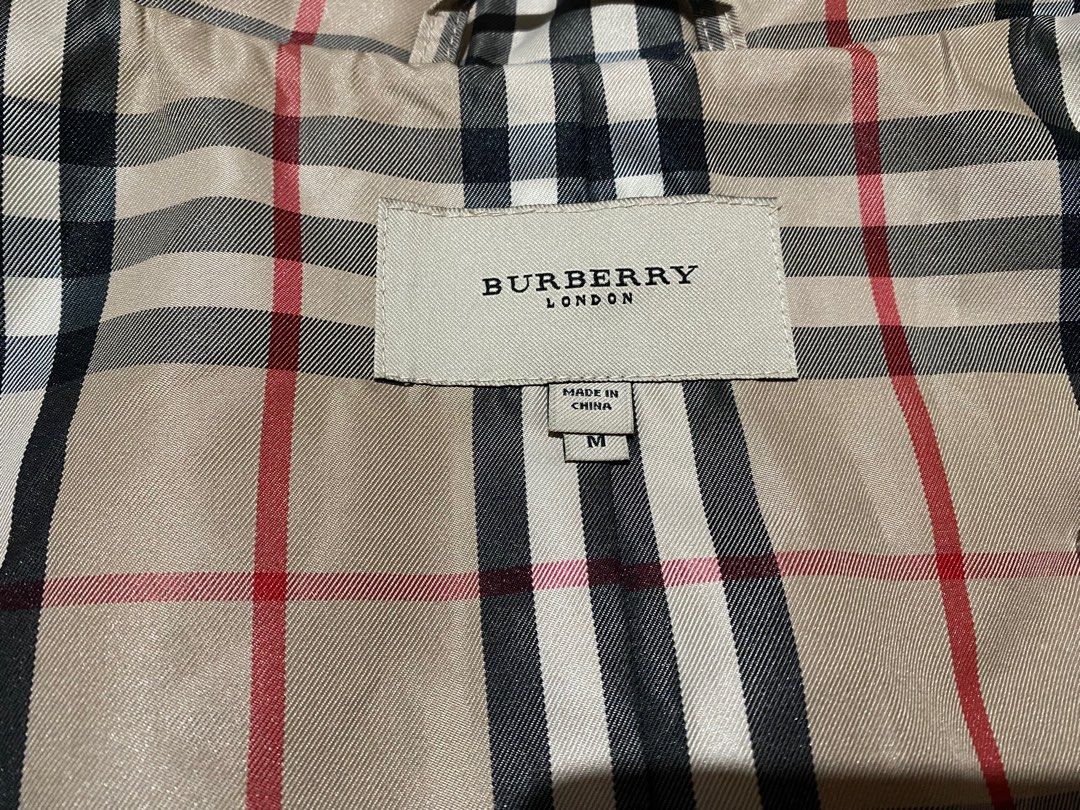 🏷️Burberry-Trench Coats (Category: Luxury Apparel) located in Quezon City. Submitted by angelamaec (Listing ID 1360860842, Image 3). Description: Excellent condition 21 1/2x37 sleeve length:25 Add shipping .