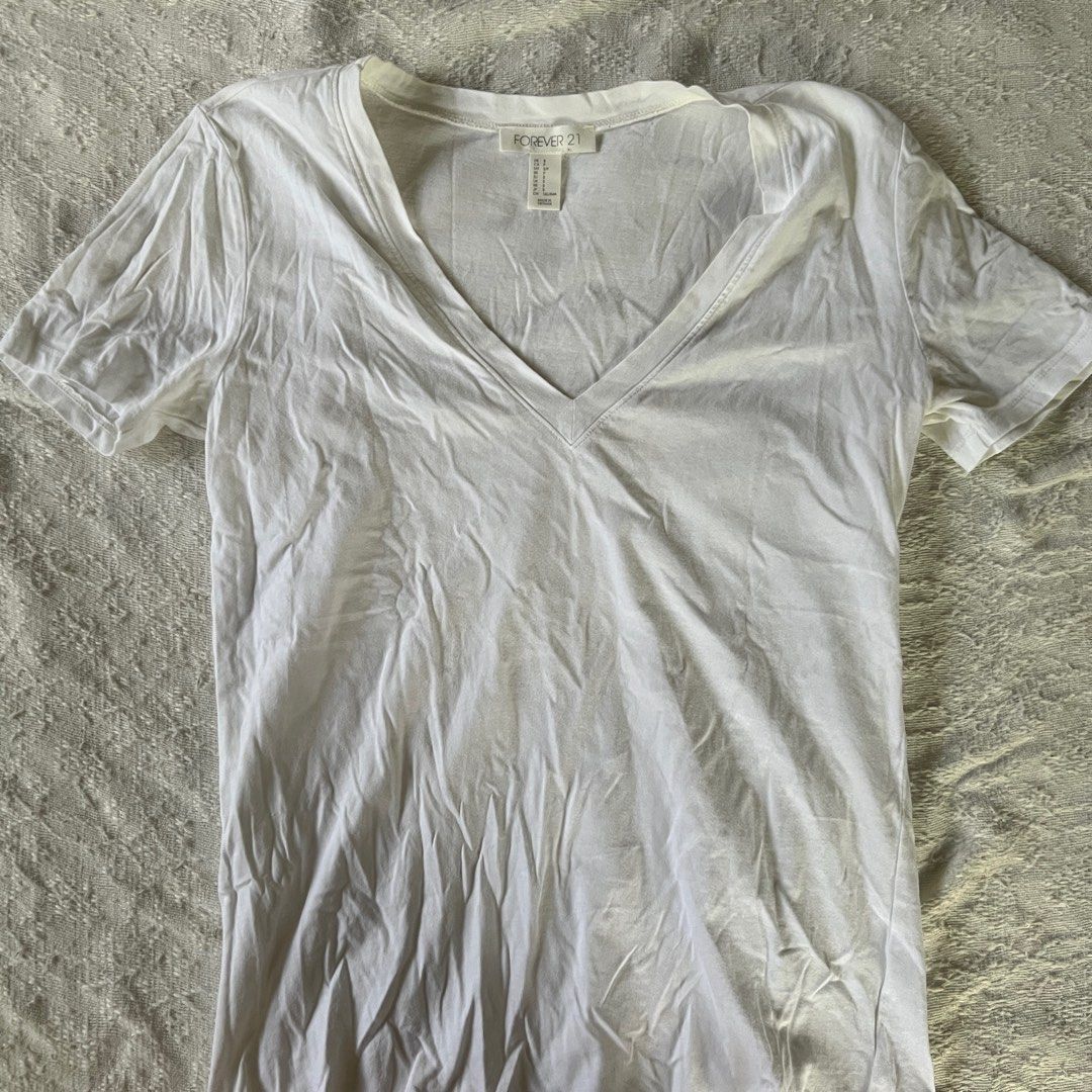 Forever 21 White V Neck Shirt (Category: Shirts) located in Rizal. Submitted by movingonsale.ph (Listing ID 1360862343, Image 1). Description: Fits xs to m No when worn Shipping from Pioneer Mandaluyong.