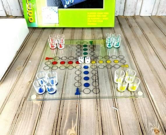 Microsoft Ludo shot glass drinking board game game (Category: Board Games & Puzzles) located in Mandaluyong City. Submitted by home_box.ae (Listing ID 1360735831, Image 2). Description: actual photo posted on hand ready to ship.