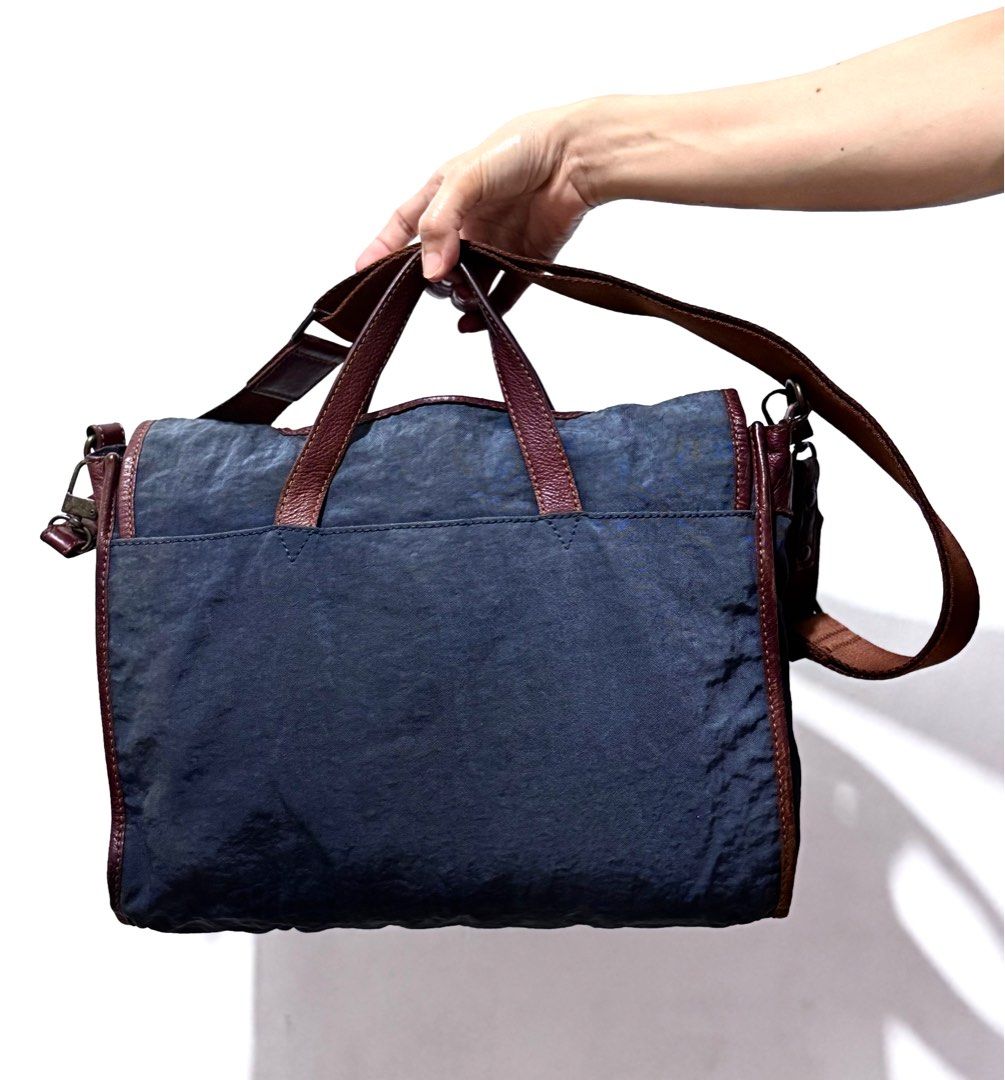 MONSAC SLING BAG / SHOULDER BAG (Category: Looking For) located in Cavite. Submitted by nomadicthriftlyf (Listing ID 1360838393, Image 2). Description: ‼️FOR SALE Original MONSAC Nylon/Leather LIGHT WEIGHT NAVY BLUE /BROWN Shoulder bag / Sling bag/ Office Bag/ Laptap bag/ Travel bag.