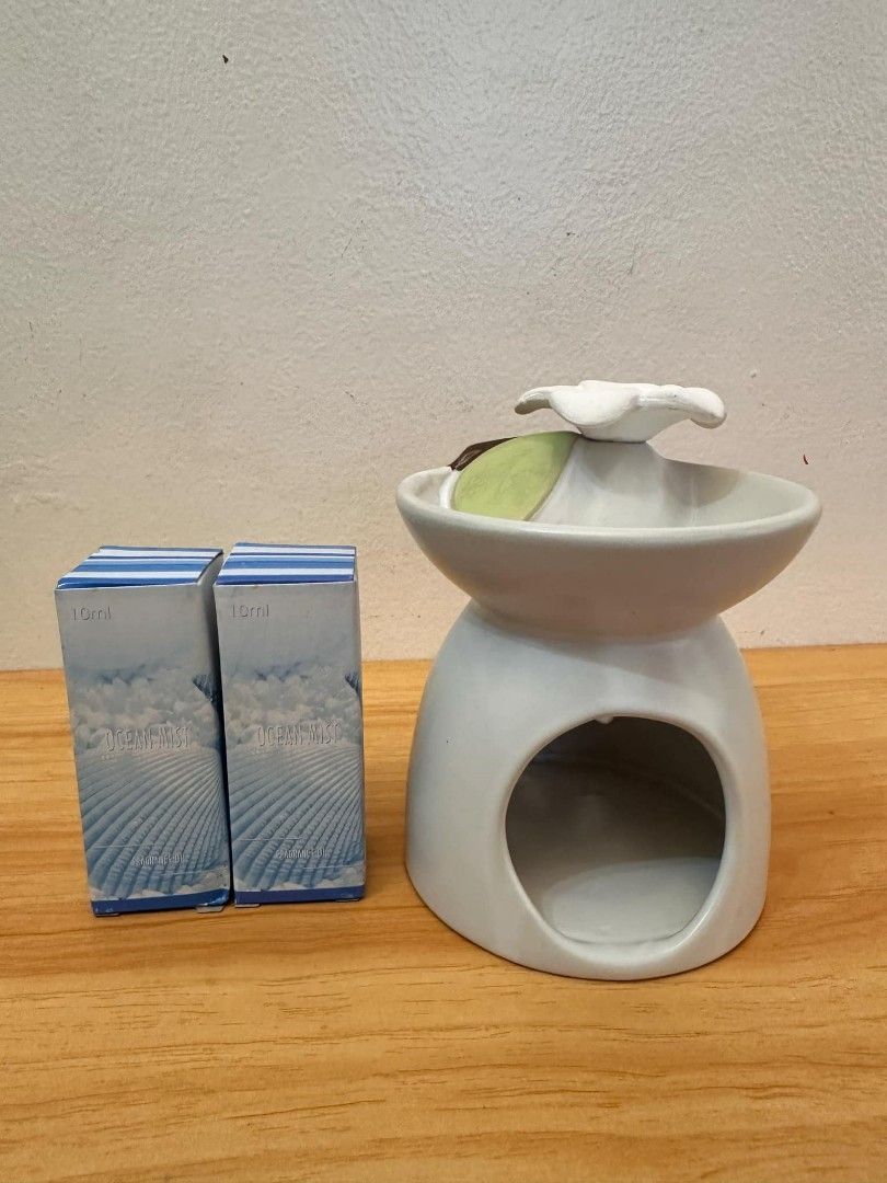 Oil burner with free 2 essential oils (Category: Other Home Decor) located in Mandaluyong City. Submitted by home_box.ae (Listing ID 1360733744, Image 1). Description: actual photo posted on hand ready to ship.