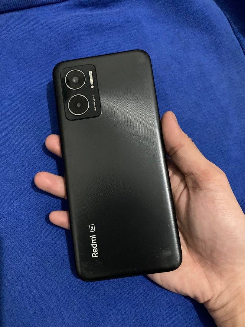 Redmi 10 5g (Category: Xiaomi) located in Manila. Submitted by omomo1 (Listing ID 1360817271, Image 2). Description: Redmi 10 5G - For sale only Display: 6.58 inches Processor: MediaTek Dimensity 700 RAM & Storage: 4GB + 128GB (expandable) Cameras: 50MP + 2MP (rear), 5MP (front) Battery: 5000mAh, 18W fast charging OS: MIUI 13 (Android 12) Security: Working Side fingerprint and face unlock Issue: dents from cases Kakapalit lang po ng screen❗ Tempe