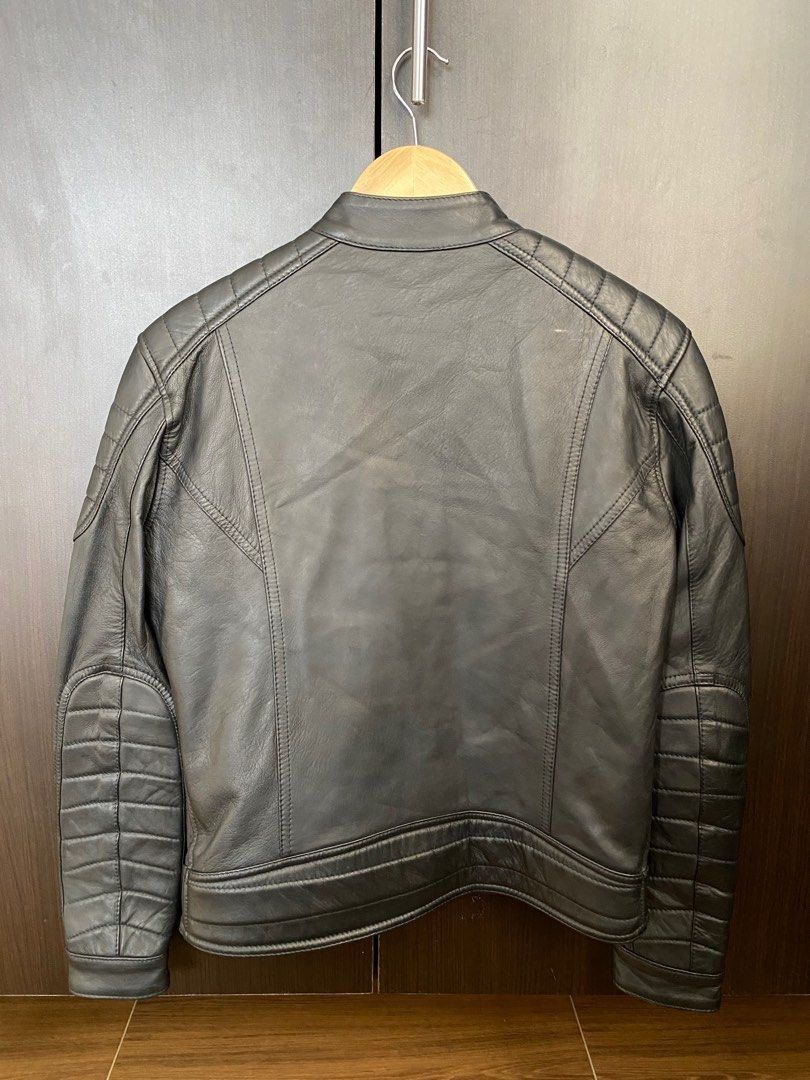 Replay Cafe Racer Leather Jacket (Category: Coats, Jackets and Outerwear) located in Urdaneta. Submitted by theoldmanstore (Listing ID 1360727068, Image 2). Description: Replay Biker Leather Jacket Tagged XS Chest-19.5 Shoulder-17 Length-25 Sleeve length-23.5 Made in Italy 100% Lambskin Mens Cafe Racer Style Biker Jacket with polyester lining. Padded shoulders and zipped cuffs, round neckline with press studs, front zipper and two zipped welt poc