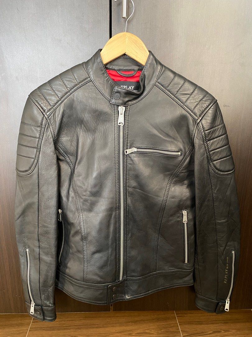 Replay Cafe Racer Leather Jacket (Category: Coats, Jackets and Outerwear) located in Urdaneta. Submitted by theoldmanstore (Listing ID 1360727068, Image 1). Description: Replay Biker Leather Jacket Tagged XS Chest-19.5 Shoulder-17 Length-25 Sleeve length-23.5 Made in Italy 100% Lambskin Mens Cafe Racer Style Biker Jacket with polyester lining. Padded shoulders and zipped cuffs, round neckline with press studs, front zipper and two zipped welt poc
