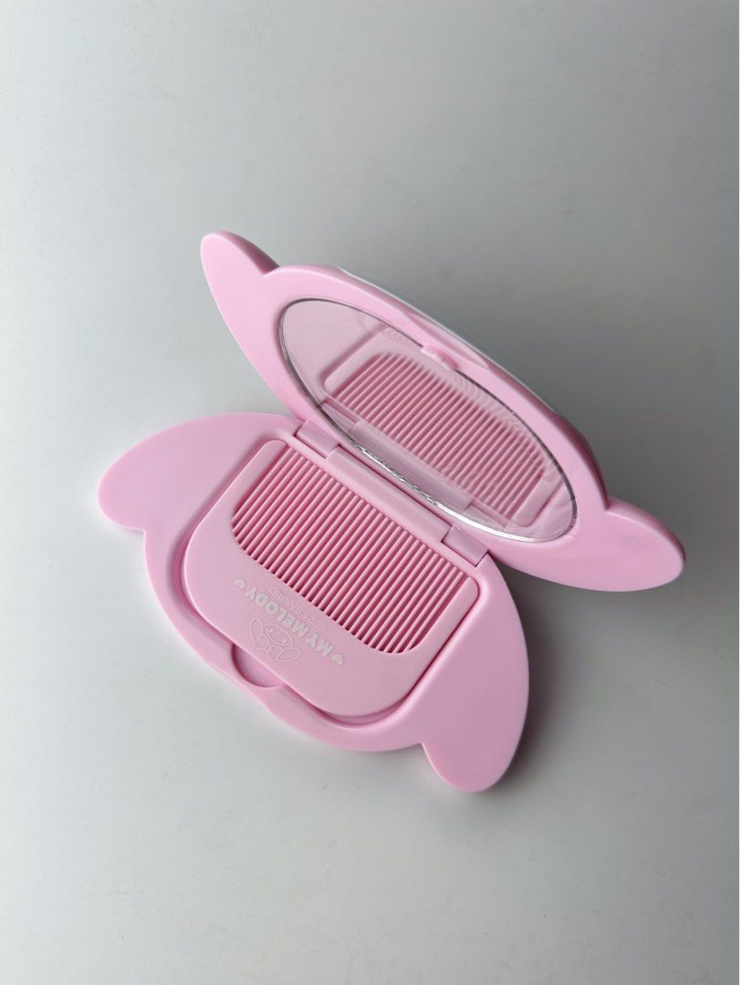 Sanrio My Melody Compact Mirror with Comb (Category: Makeup) located in Manila. Submitted by pochaccolate (Listing ID 1360731381, Image 1). Description: New Arrival: A mirror and comb in one—because looking cute should always be this easy ! Perfect for your purse, pocket, or travel bag 👜🪞 *don’t forget to peel the protective film before use Sanrio Compact Mirror with Comb ౨ৎ ˖ ࣪⊹ Available designs 🍵 Hello Kitty 🍵 My Melody 🍵 Cinnamoroll (sol