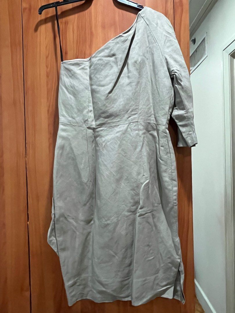 Tailored linen one shoulder dress (Category: Dresses) located in Makati City. Submitted by gapofa (Listing ID 1360857914, Image 2). Description: Super unique tailored piece by Thai designer. Linen grey fabric fully lined. Simple cut that can be dressed up with the right accessories for understated chic. Great for a wedding.