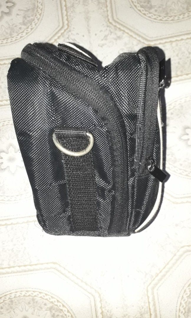 Toploader Camera Bag (Category: Camera Bags & Carriers) located in Quezon City. Submitted by Mr._Vintageous (Listing ID 1360743247, Image 3). Description: Up for Sale! Toploader camera bag. Has 2 outer zippered pockets. Can be used with DSLR , Mirrorless or Film SLR camera bodies. Comes with shoulder strap. Sample camera body is Nikon D60 D60 with 50mm prime lens. Actual pictures posted. Meet up along SM Fairview. Shipping available at buyer's ex