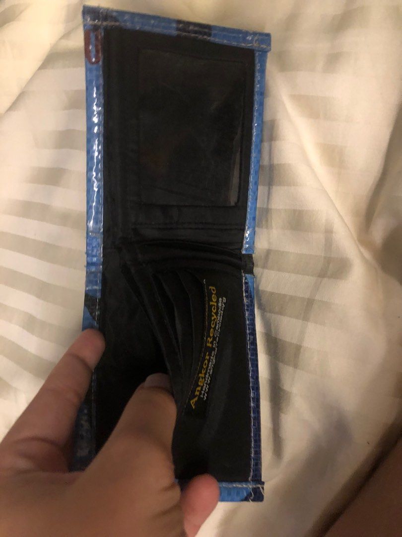 Wallets (Category: Wallets & Card Holders) located in Singapore. Submitted by lex447789 (Listing ID 1360806611, Image 6). Description: Black leather wallet with coin holder cash and card holder-15$ Light blue dark blue Cambodia recycled wallet with cash and card holder 15$ for both Orange cash card and coin holder-5 .