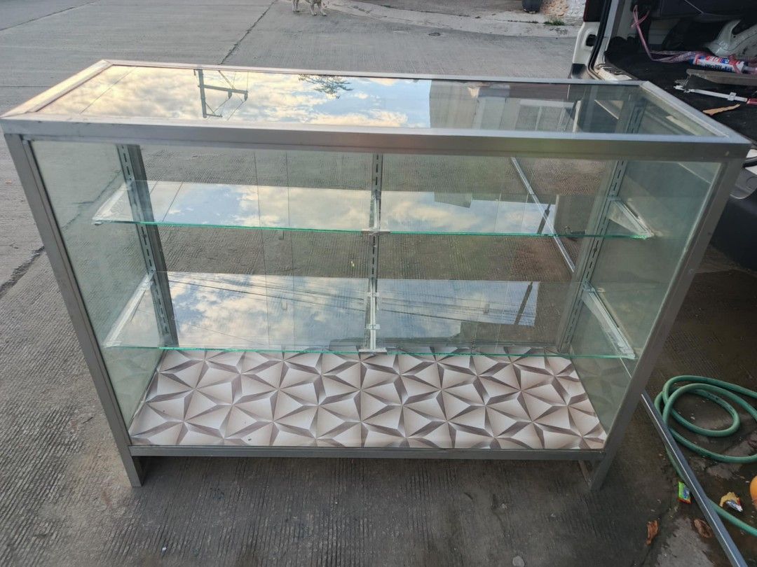4 feet Glass Stante 3 Layer (Category: Office Furniture & Fixtures) located in Rodriguez. Submitted by amara0914 (Listing ID 1360889154, Image 3). Description: For Sale 2nd Hand In Great Condition No Hidden Issues or Crack 3 Layer Glass Stante 4feet length or haba 31 inches height or taas 16 inches width or lapad.