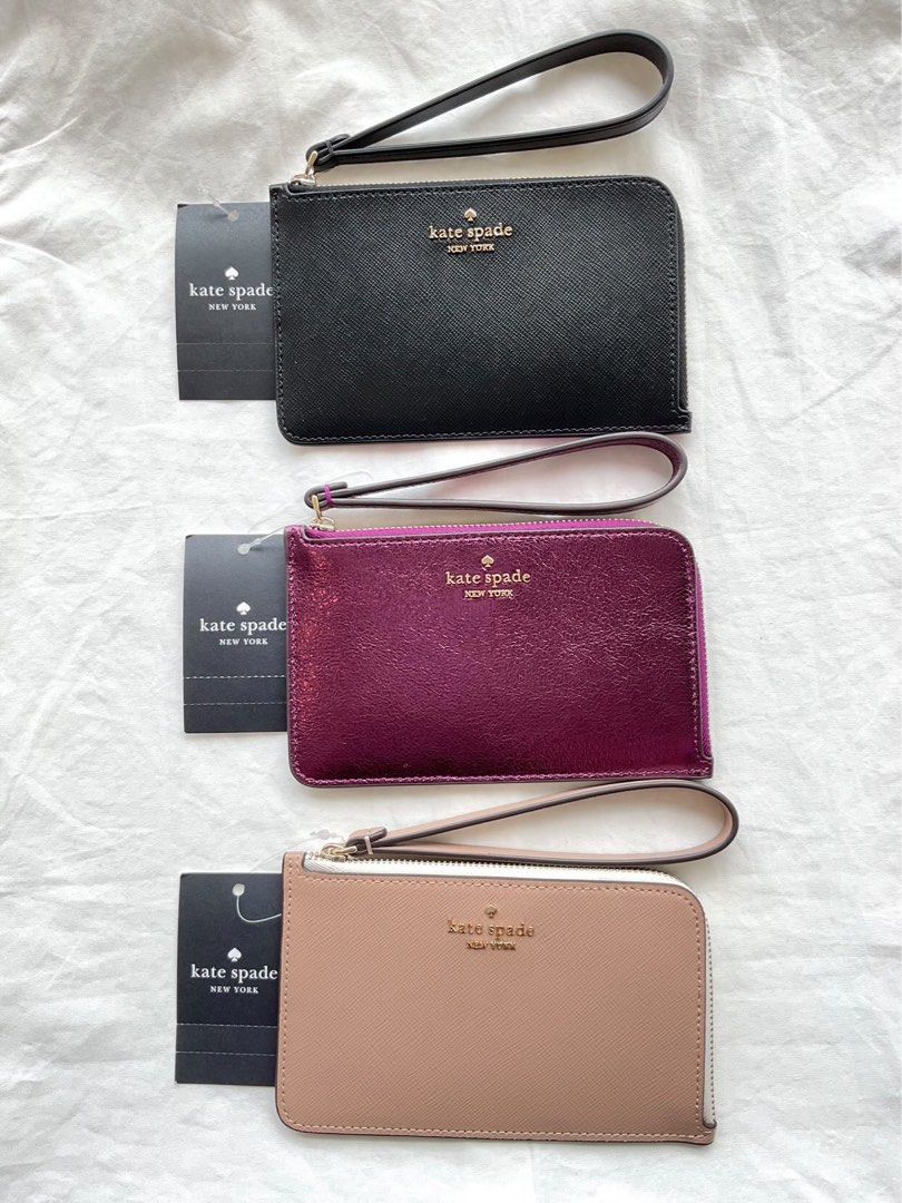 Authentic Kate spade small L-zip wristlet (Category: Wallets & Card holders) located in Taytay. Submitted by delutterproject (Listing ID 1360900054, Image 2). Description: Brand new Authentic Kate Spade small L-zip wristlet - ₱3,000 only -metallic dark raspberry -Black -Bi color hazelnut ⚫️Onhand; Ready to ship (Lalamove/J&T express) Guaranteed authentic from US.