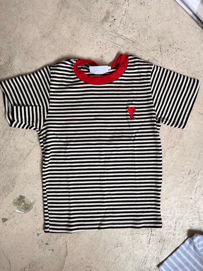 Bundle T Shirt Blouse (Category: Blouses) located in Bulacan. Submitted by handlewithcaution (Listing ID 1360921566, Image 2). Description: Dalawa na 350, isang beses lang nagamit. May kupas ng red na hindi mayado halata. Small size RFS: decluterring.