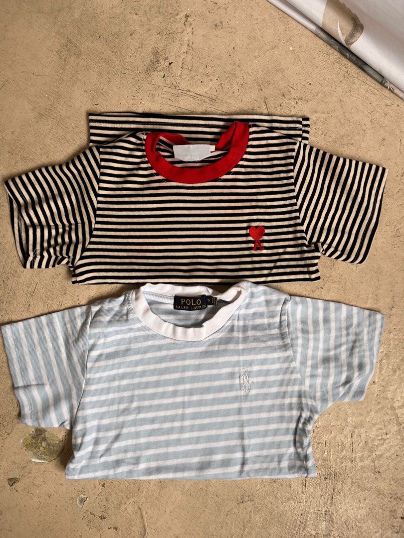 Bundle T Shirt Blouse (Category: Blouses) located in Bulacan. Submitted by handlewithcaution (Listing ID 1360921566, Image 1). Description: Dalawa na 350, isang beses lang nagamit. May kupas ng red na hindi mayado halata. Small size RFS: decluterring.