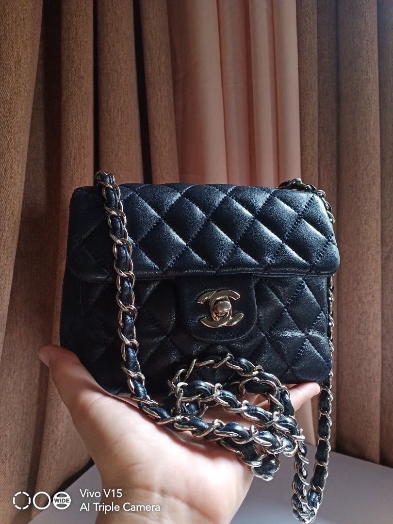 Chanel mini flap (Category: Luxury Bags & Wallets) located in Tagum. Submitted by luxbagelyas (Listing ID 1360936674, Image 3). Description: with sign of use .minimal rubs sa cornes matibay malinis loob leather parang navy blue actual color neto silver hardware kasya phone.