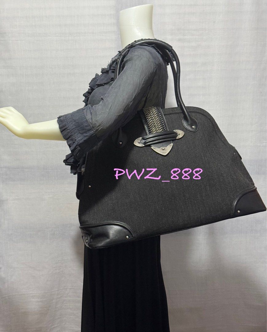 CHRISTIAN DIOR Large Alma Weekender Bag (Category: Luxury Bags & Wallets) located in Baguio. Submitted by pwz-eshop (Listing ID 1360901000, Image 2). Description: • Up for Grabs!! • Guaranteed Authentic!! • Flaws: Minor rubs on base corners. Surface scratches on leather. (please see photos) • BRAND: CHRISTIAN DIOR • DIMENSIONS: length 18.25", height 13.25", width 7.25", handle drop: 6.5". • SERIAL NUMBER: 05-MA-0057. • COUNTRY OF ORIGIN: ITALY. •