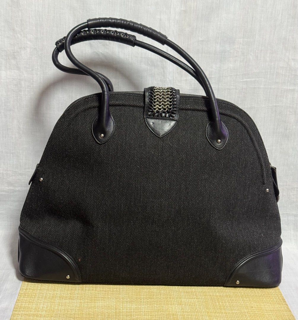 CHRISTIAN DIOR Large Alma Weekender Bag (Category: Luxury Bags & Wallets) located in Baguio. Submitted by pwz-eshop (Listing ID 1360901000, Image 3). Description: • Up for Grabs!! • Guaranteed Authentic!! • Flaws: Minor rubs on base corners. Surface scratches on leather. (please see photos) • BRAND: CHRISTIAN DIOR • DIMENSIONS: length 18.25", height 13.25", width 7.25", handle drop: 6.5". • SERIAL NUMBER: 05-MA-0057. • COUNTRY OF ORIGIN: ITALY. •