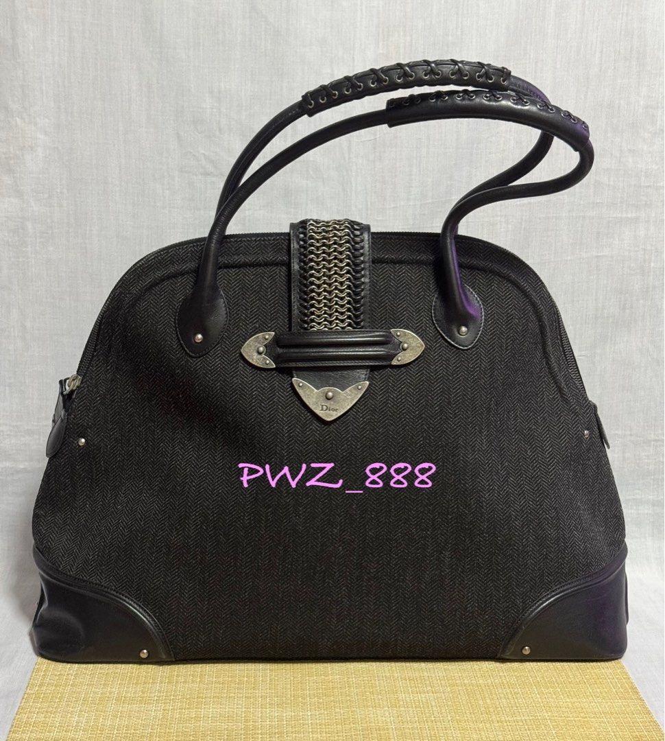 CHRISTIAN DIOR Large Alma Weekender Bag (Category: Luxury Bags & Wallets) located in Baguio. Submitted by pwz-eshop (Listing ID 1360901000, Image 1). Description: • Up for Grabs!! • Guaranteed Authentic!! • Flaws: Minor rubs on base corners. Surface scratches on leather. (please see photos) • BRAND: CHRISTIAN DIOR • DIMENSIONS: length 18.25", height 13.25", width 7.25", handle drop: 6.5". • SERIAL NUMBER: 05-MA-0057. • COUNTRY OF ORIGIN: ITALY. •