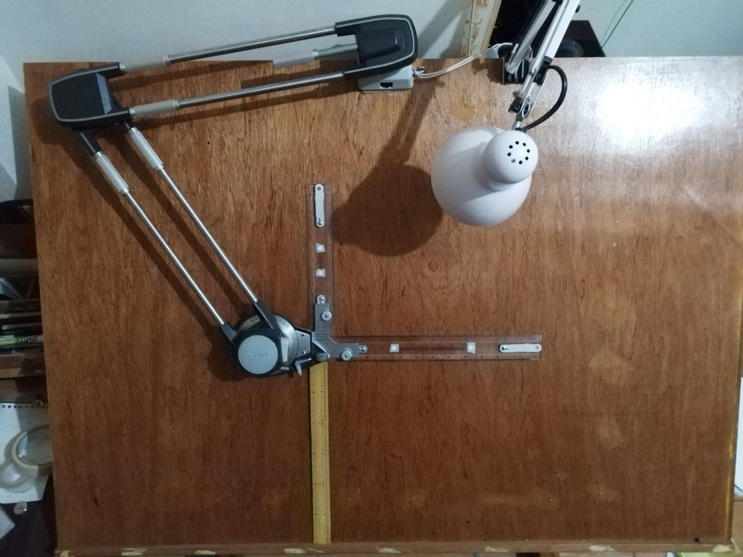 Drafting table with machine (Category: Tables & Sets) located in San Rafael. Submitted by dione56 (Listing ID 1360935659, Image 2). Description: Drafting Table Solid wood Adjustable angle 0° to 90° 30" by 42" size With Kent Drafting Machine Kasama na po ilaw if gusto niyo For architectural, technical and engineering drawings Bulacan Location.