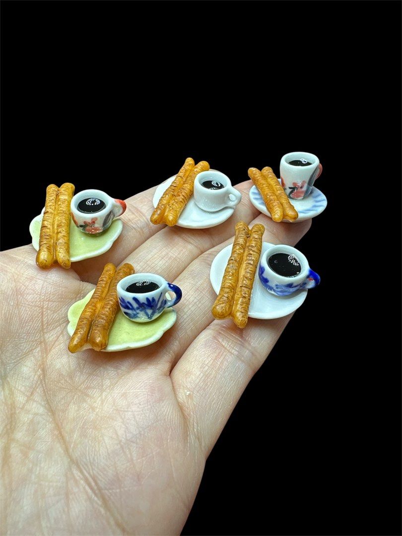 Handmade Miniature Breakfast Dim sum Youtiao with Black Coffee, Clay, 1 set (Category: Handmade Craft) located in Singapore. Submitted by mini.collectibles.1 (Listing ID 1360894221, Image 1). Description: Handmade Miniature Breakfast Dim sum Youtiao with Black Coffee, Clay, 1 set Made from clay There may be some finger pressing stains or prints due to handmade. Miniature Showcase Display Store at the address below: Blk 2019 Bukit Batok St 23 (Ind