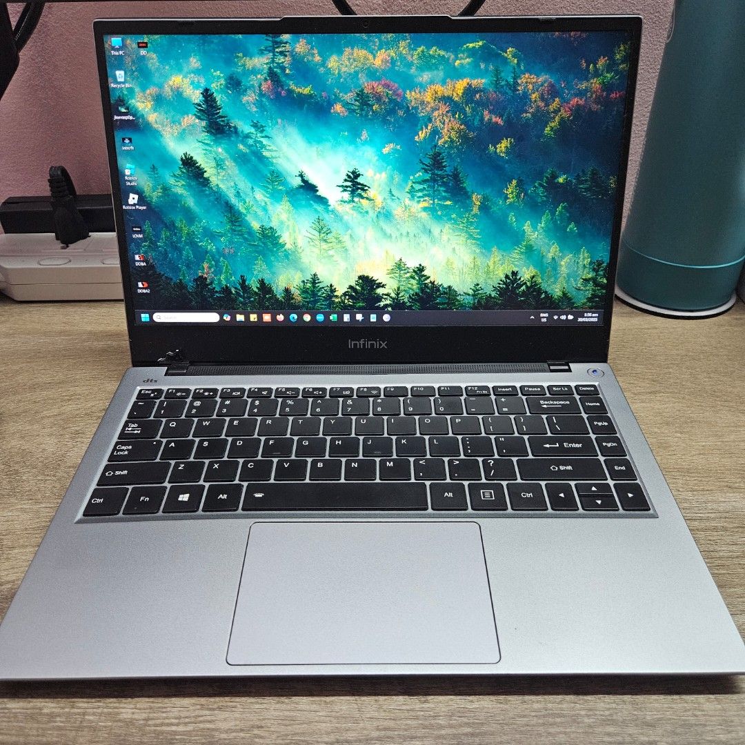 Infinix INBook X1 Laptop with issues (Category: Laptops & Notebooks) located in Pasig City. Submitted by ms.sj_____ (Listing ID 1361027264, Image 2). Description: Issues: Battery swelling Screen hinge broken other than that, still working perfectly pwede pa naman pagtiyagaan or just buy for parts. price open for negotitation. item for pickup in Pasig area.