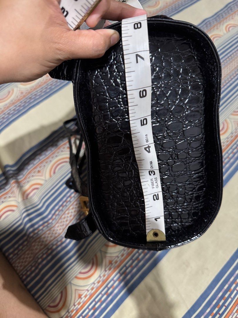 Mini Backpack (Category: Backpacks) located in Caloocan City. Submitted by ruthay23 (Listing ID 1360979310, Image 2). Description: Black backpack leather bag like new No dust bag Measurements: Tall - 10 inches Base Wide - 8 inches x 5 inches Price: 500 + SF GCash payment or BDO Grab/Lalamove Loc: Deparo, Caloocan City.