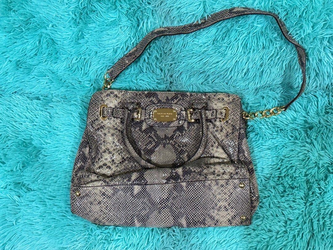 Preloved MK Hamilton Python embossed shoulder bag (Category: Luxury Bags & Wallets) located in Caloocan City. Submitted by ruthay23 (Listing ID 1360981963, Image 3). Description: Preloved MK Hamilton Python embossed shoulder bag No dust bag Price: 3000 + SF GCash payment or BDO Grab/Lalamove Loc: Deparo, Caloocan City.
