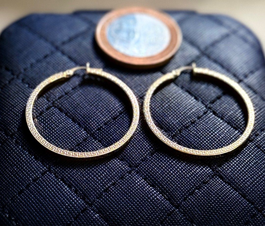 18K gold loop earrings (Category: Earrings) located in Iloilo. Submitted by cheenaaa (Listing ID 1350645408, Image 3). Description: 18K Saudi gold 2.6 grams Fend! design loop earrings .