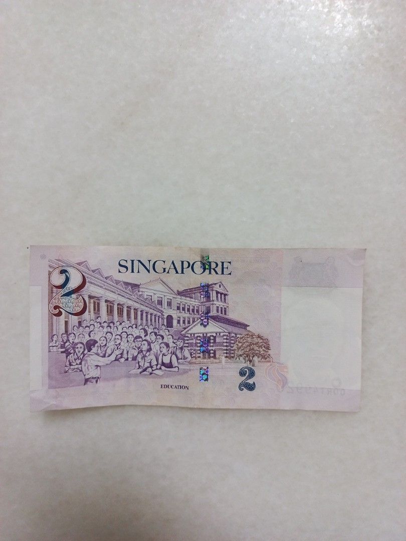 $2 note (Category: Everything Else) located in Singapore. Submitted by madwave58 (Listing ID 1356151259, Image 2). Description: not ordinary 2 dollars note take note extreme left top corner n right lower corner. selling for 5 dollars self collect sembawang way blk 355a cash deal5.00.