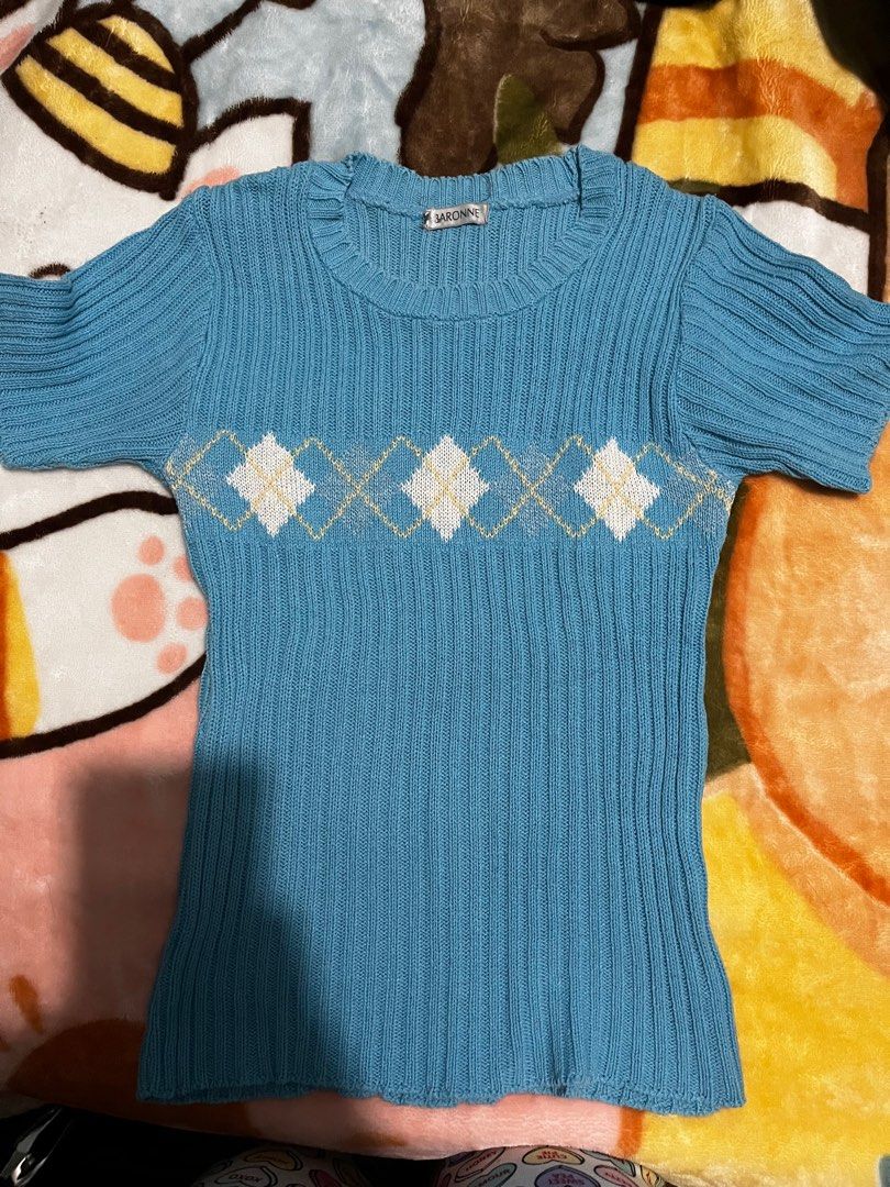 Cute knit shirt (Category: Shirts) located in Baguio. Submitted by kaudry_ (Listing ID 1356233620, Image 1). Description: ✅Size: S-M ✅Still super cute. Used but not abused RFS: decluttering .