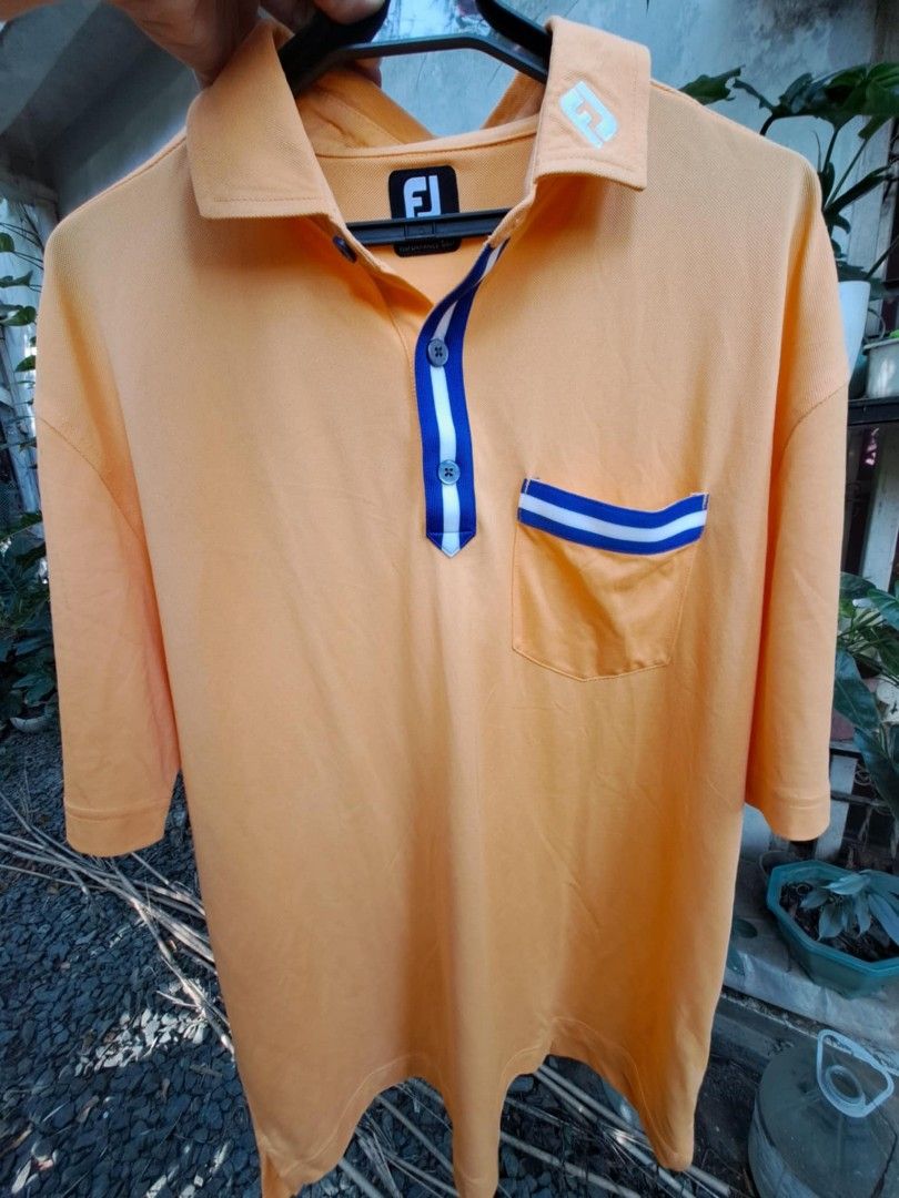 Fj golf shirt (Category: Golf) located in Cainta. Submitted by dhengskie (Listing ID 1356081772, Image 2). Description: not used. just stock in the cabinet. large size.