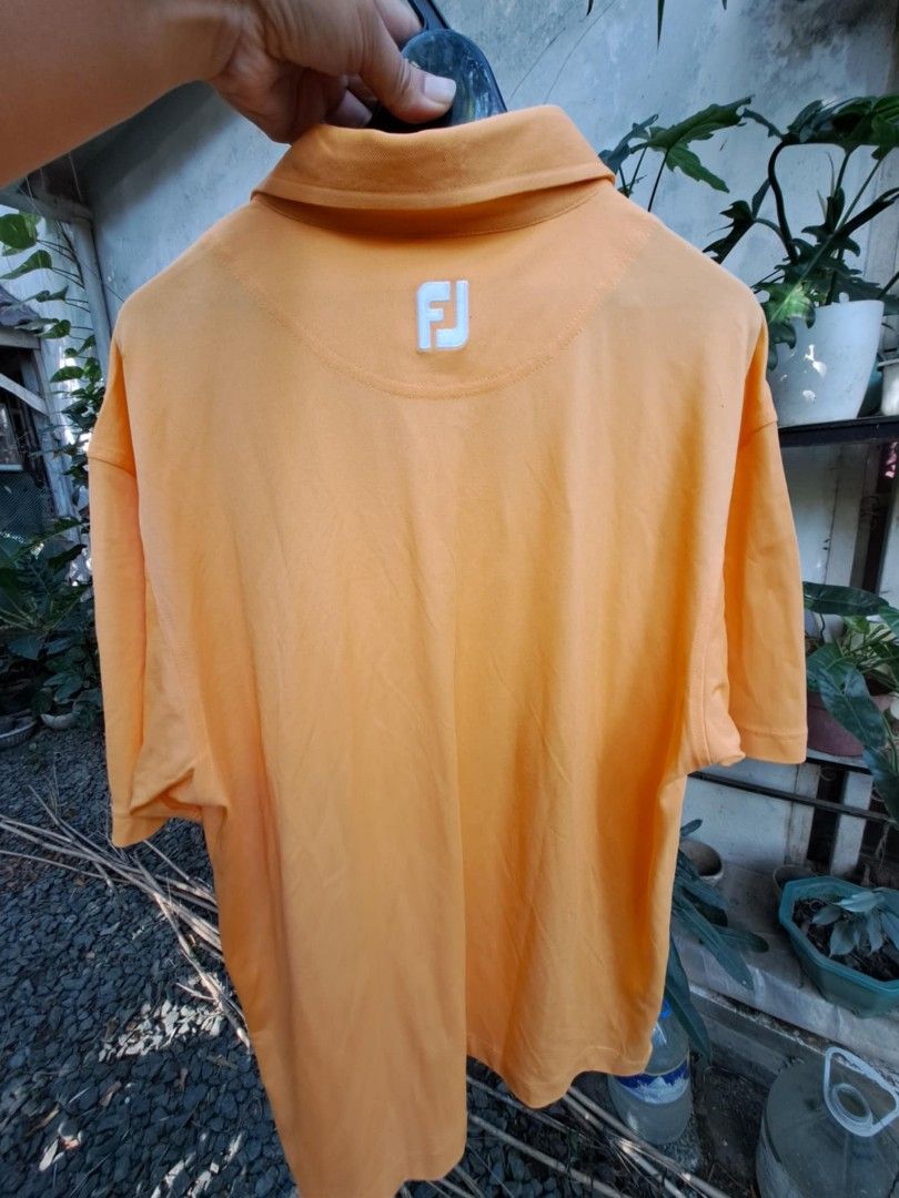 Fj golf shirt (Category: Golf) located in Cainta. Submitted by dhengskie (Listing ID 1356081772, Image 3). Description: not used. just stock in the cabinet. large size.