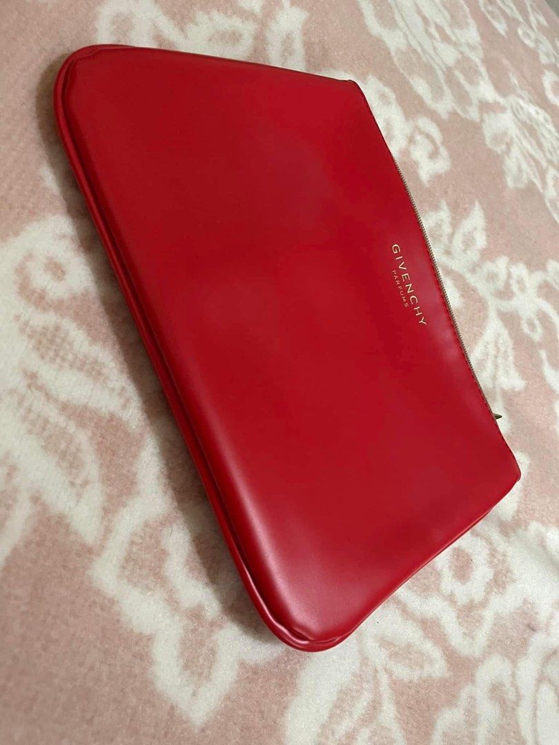Givenchy (Category: Luxury Bags & Wallets) located in Famy. Submitted by liezl.marie (Listing ID 1356226530, Image 3). Description: Givenchy Novelty Cosmetic Pouch Unused Open for layaway..