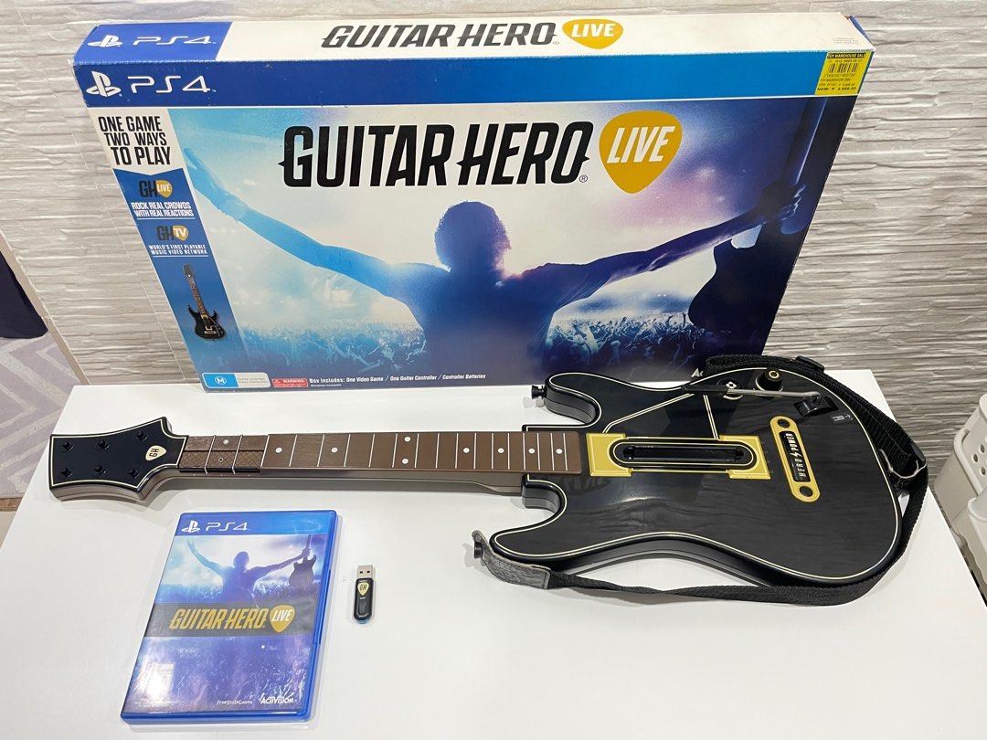 GUITAR HERO LIVE CONTROLLER (Category: Controllers) located in Manila. Submitted by jen_888 (Listing ID 1350647418, Image 2). Description: GUITAR HERO LIVE CONTROLLER • With Dongle • With Box • RFS: Issue is di na ata gumagana pag sa battery DM for inquiries📩.