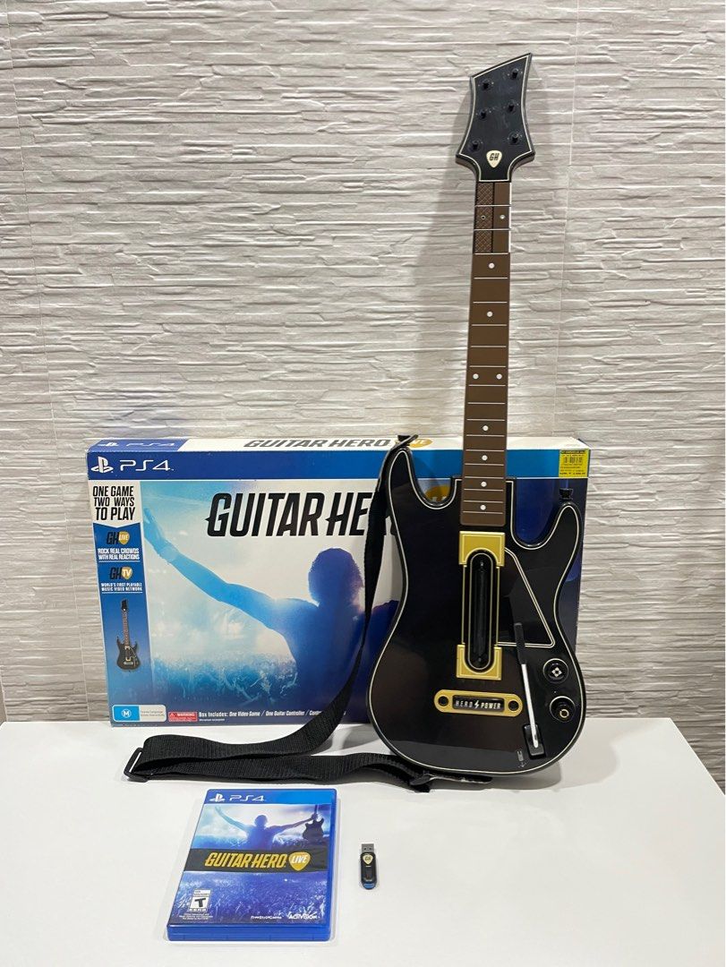 GUITAR HERO LIVE CONTROLLER (Category: Controllers) located in Manila. Submitted by jen_888 (Listing ID 1350647418, Image 1). Description: GUITAR HERO LIVE CONTROLLER • With Dongle • With Box • RFS: Issue is di na ata gumagana pag sa battery DM for inquiries📩.